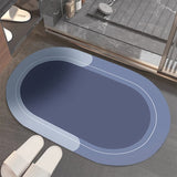 Tapis de bain<br> bleu ovale