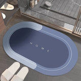 Tapis de bain bleu ovale