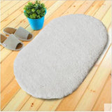 Tapis de bain<br> gris ovale