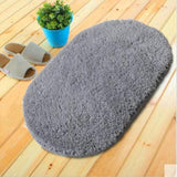 Tapis de bain gris ovale